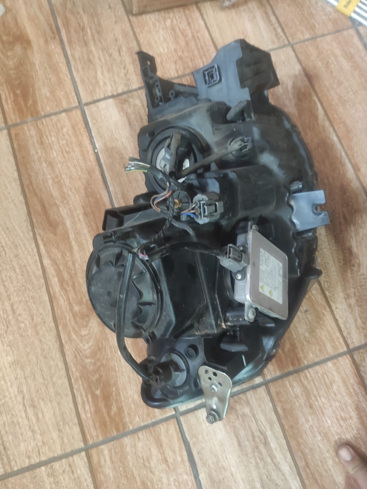 Farol Dianteiro Esquerdo Pajero dakar L200 Xenon 09-16 origi