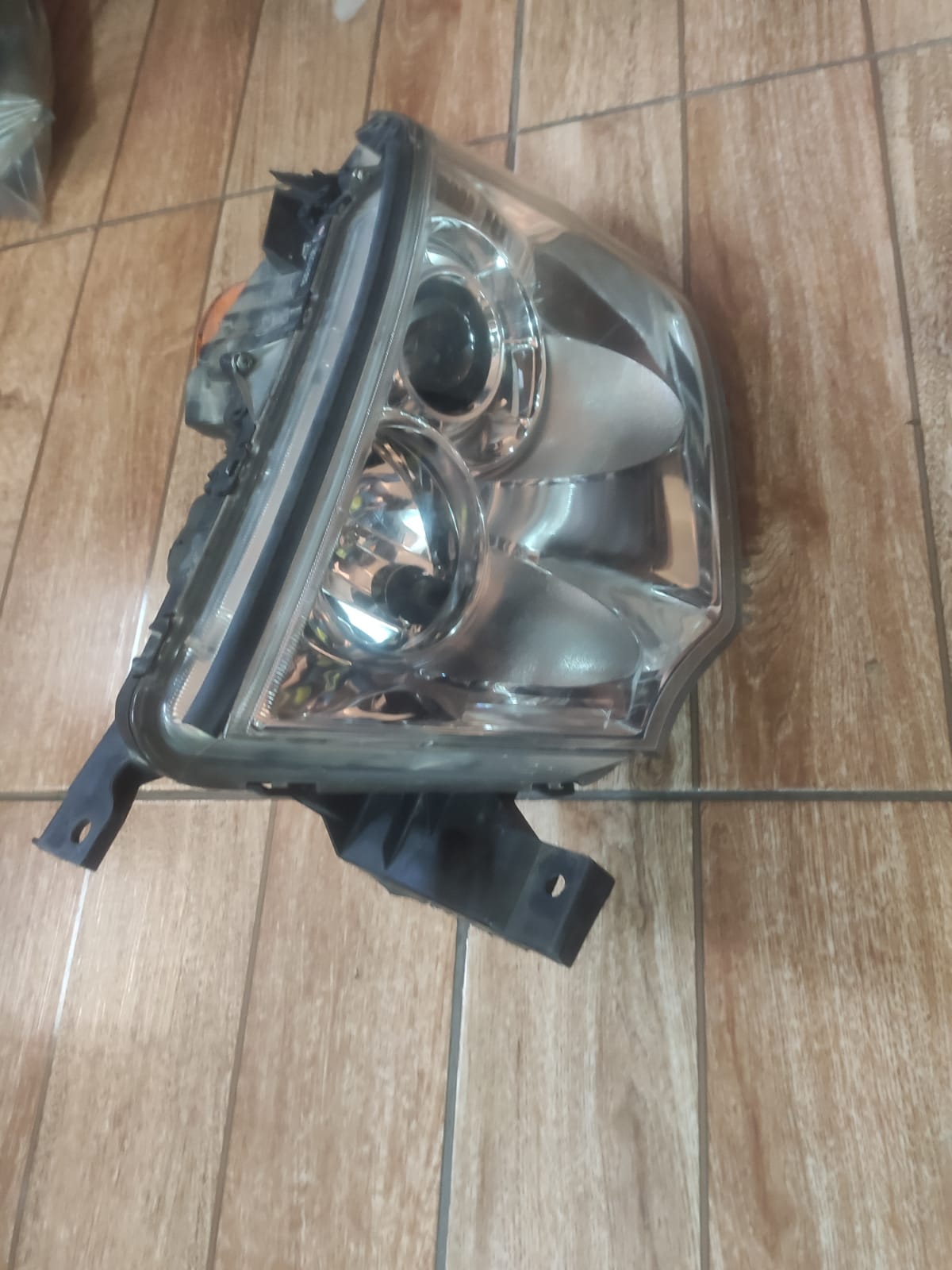 Farol Dianteiro Esquerdo Pajero dakar L200 Xenon 09-16 origi